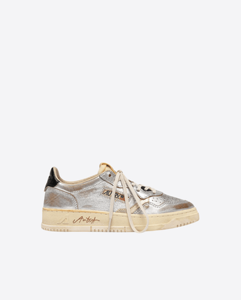 AUTRY SCARPE SNEAKERS MEDALIST LOW SUPER VINTAGE IN PELLE ARGENTO PLATINO E NERO