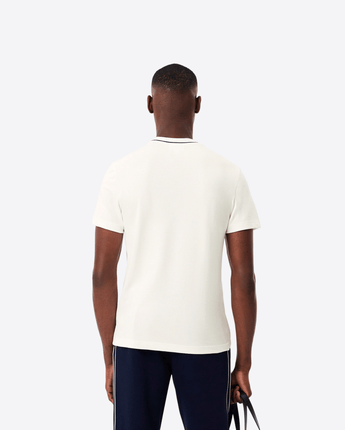 LACOSTE Abbigliamento e accessori T-shirt in piqué elasticizzato con colletto a righe