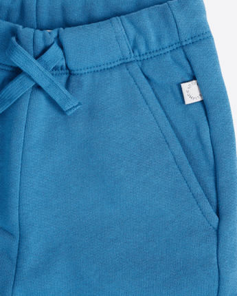 Stella McCartney BLU Pantaloni blu per neonato con modno e sole